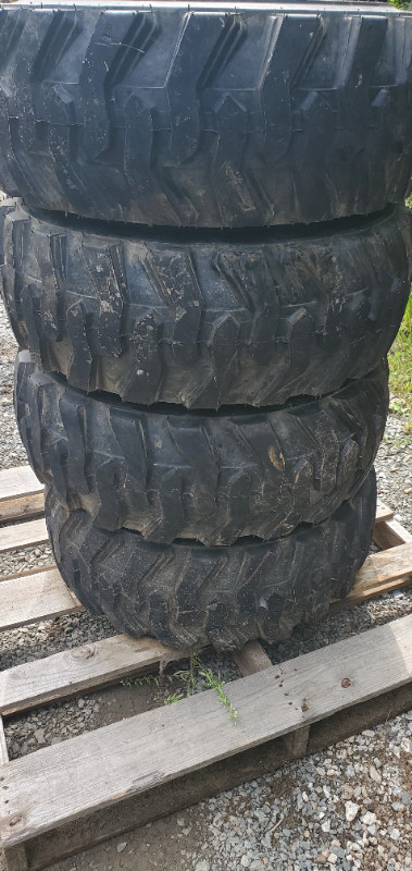 new 12x16.5 skidsteer tires on rims in Tires & Rims in Bedford