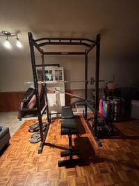 Squat Rack/barbell/metal weights 
