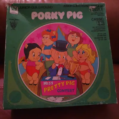 Loony Tunes Porky Pig circular puzzle, 125 pce. Box shows 40 years of wear, pieces are in good used...