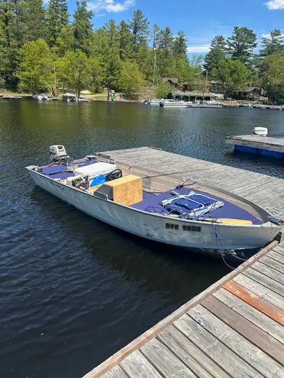 Trailer boat and motor for sale This boat is deep and wide perfect for stability in the water Boat d...