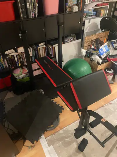 Adjustable bench press, with leg extension add on. Bar and curl bar included as well as 120lbs of as...