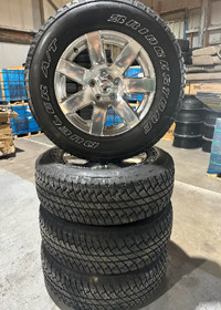 Like new 18 inch Jeep Grand Cherokee rims Bridgestone tires