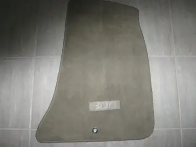 Complete set of used , 2 front and 2 rear, original equipment fabric floor mats. Beige in colour. Re...