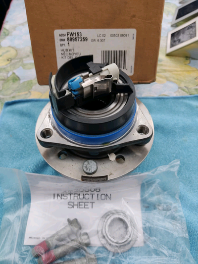 Front wheel hub and bearing assembly with wheel speed sensor and wheel studs. Part# AC Delco FW153....