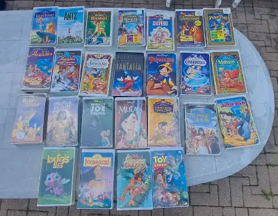 Collection of 25 Disney and other VHS tapes! This lot includes a variety of classic titles like The...