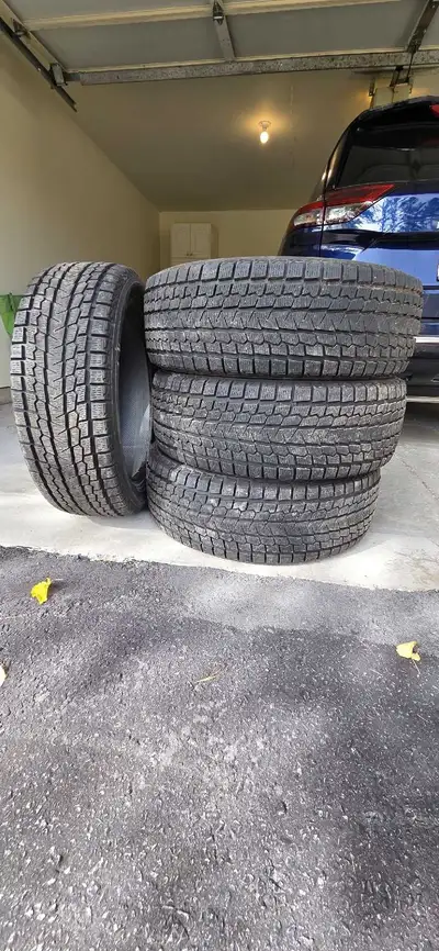 4 Yokohama GO75 Ice Guard snow tires 235/55R20, tread depth new 13/32, these are 10/32, 75% tread re...
