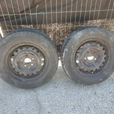 2 Champiro Touring tires, size 225/65 R17 mounted on steel rims. These tires are used but still have...