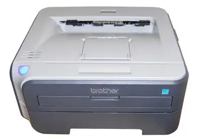 Laser printer Brother HL 2140 perfect condition ,new toner $40, View more