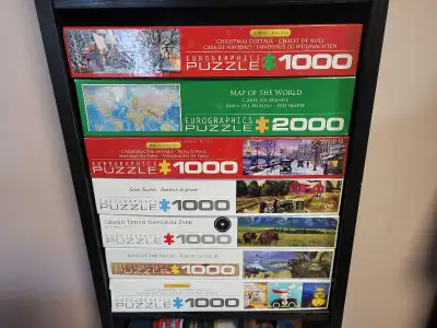 I am selling a large collection of premium jigsaw puzzles including various Eurographics and Cobble...
