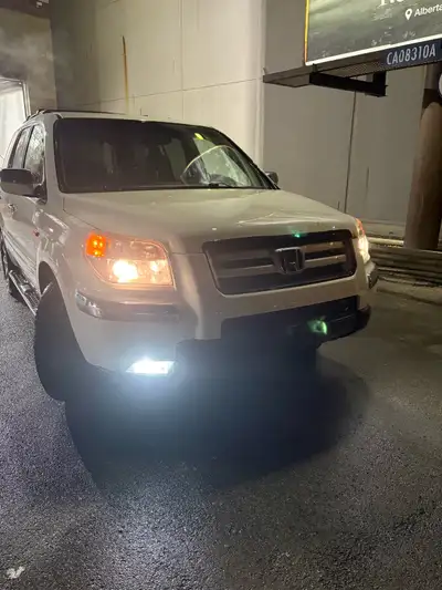 Honda pilot with 231k kms, sunroof, remote starter and all weather tires. Active status does have mi...