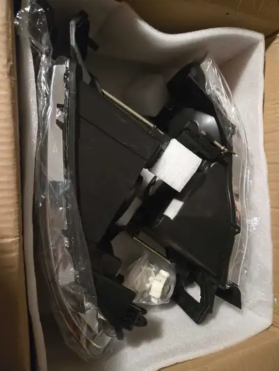 Brand new, in box, chrome/amber headlights for 2002 - 2005 Dodge Ram 1500, 2500 or 3500. Price: $120