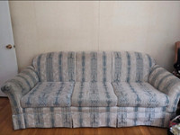 Long comfy couch with cool paisley print