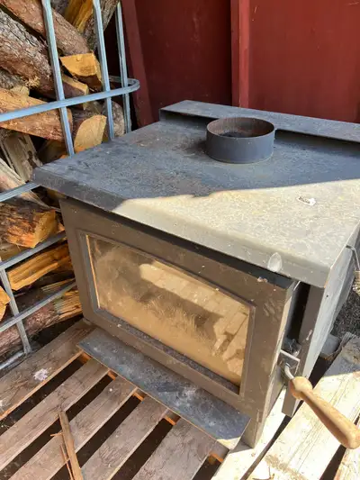 Wood stove worked great - used to heat shop replaced for a bigger unit