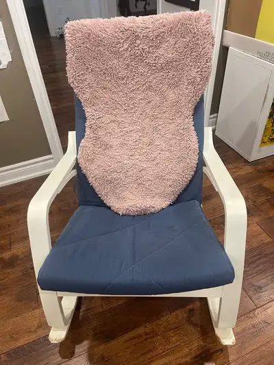 This is a used IKEA Poang Rocking Chair, perfect for adding a cozy touch to any room! It features a...