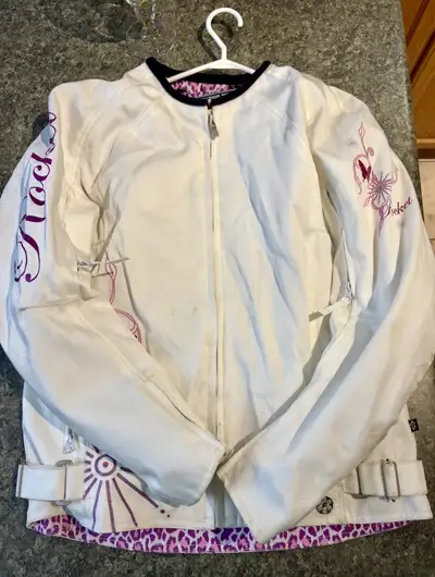 Rocket brand motorcycle Jacket Ladies size L Only wore a handful of times.