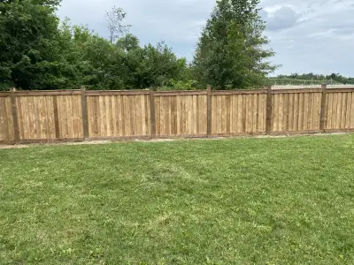 $52 a linear foot fence 6’ high fence 6x6 posts 2x6 cross members Post caps All pressure treated woo...