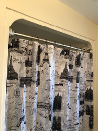 Curved shower curtain rod