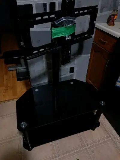 TV stand in very good condition, hardware included 35"wide asking 45.00 delivery available in Hamilt...