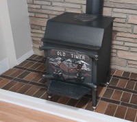 Old timer solid fuel iron fireplace