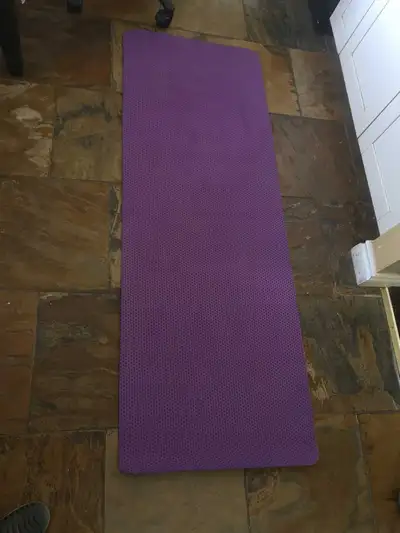 Get ready to flow with this used yoga mat, perfect for your home practice or studio sessions. This m...