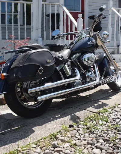 Selling a stunning Harley‑Davidson Softail Deluxe with timeless chrome styling and a powerful 103ci...