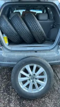 set of four Continental rims and tires