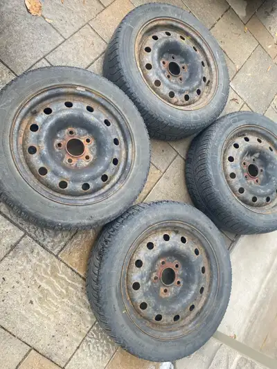 4 Toyota Corolla steel rims with tires, tires are not good, 5X100, I also have 15 inch rims for Coro...