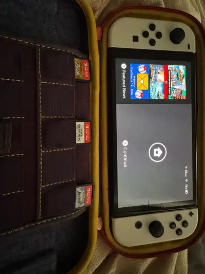 Like brand new. Comes with 3 physical games; Zelda breath of the wild, super smash bros and pokemon...