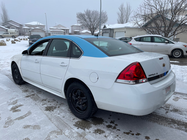 2011 Impala two sets of tires in Cars & Trucks in Red Deer - Image 3