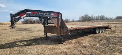 Triple axle, gooseneck trailer with beaver tail, ramps, 21000 lbs, torsion bars, spare tire,
