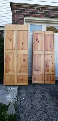 Two solid wood folding door for sale $100 each