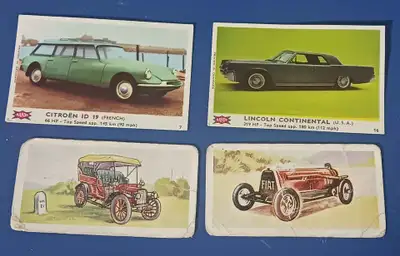 Group of old automotive cards includes vintage Lincoln Continental and antique Fiat. They have wear....