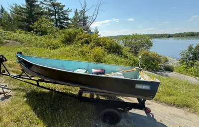 Boat, Motor and Trailer package Everything works great, light boat no leaks. 8HP Evinrude motor Perf...