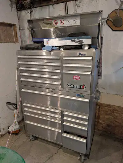 Stainless steel toolbox and top chest full of tools. Want to trade for a aluminum fishing boat motor...