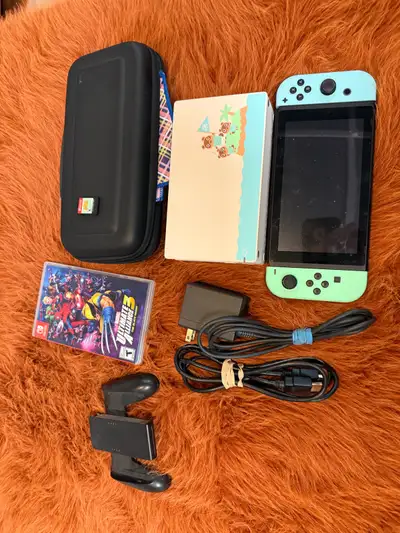 Nintendo Switch édition Animal Crossing + 2 jeux – complète, View more