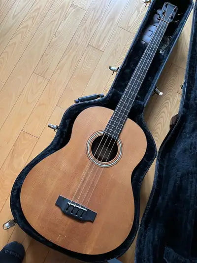 Larrivée acoustic bass guitar 1995 Ish built-in electronics full size body. Very nice playing very n...