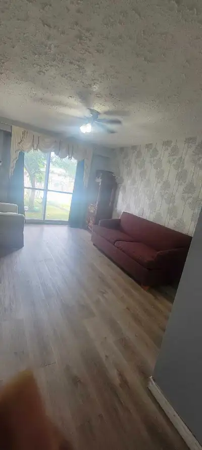 Furnished Room Main flr Females house Great Location