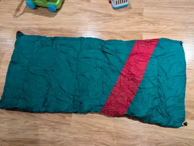 Reversible Green & Red Sleeping bag and waterproof bag, View more