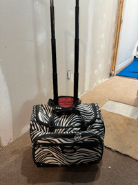 Kathy Ireland - Under seat luggage roll bag. Fits laptop