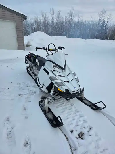 Selling my: 2013 Polaris 800 Pro RMK, 2235M, 163" track, tunnel bag with shovel. Mountain addiction...