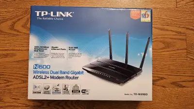 Tplink n600 ADSL2+modem wireless dual band router for sale. Used for a few months, like new with box...