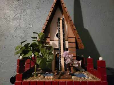 $50 ...resembles a church 4 foot tall metal budgie cage thin white. Ppastic bottom $50...not used Pi...