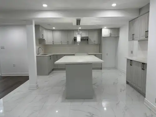 Beautifully finished new 1,000 sq ft 3 bedroom basement apartment, perfect for families or professio...