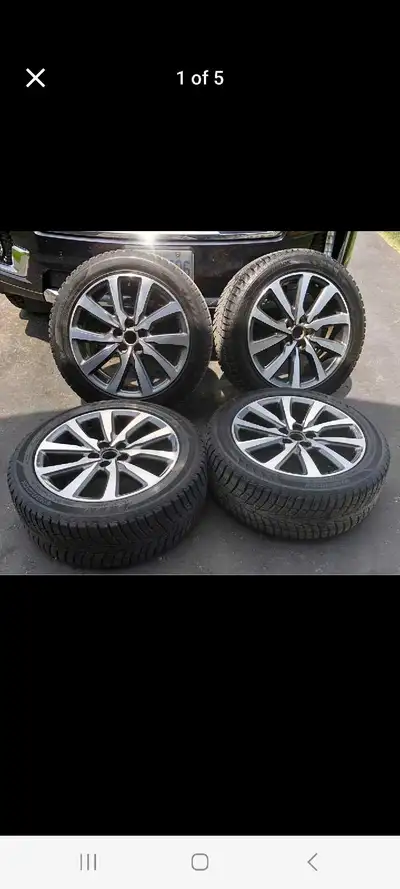 For sale: Winter tires and rims. Came off a Lincoln Continental Reserve. Used one season (November 2...