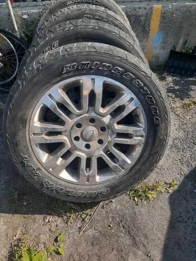 Selling a set of 4 Bridgestone Dueler P275/55R20 tires and rims that came off a Ford F150 truck; the...