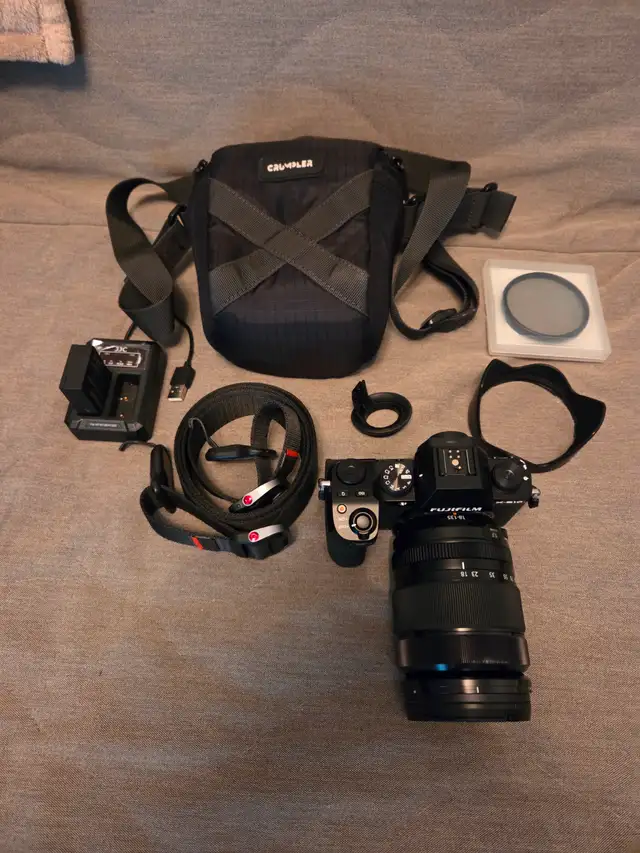Fujifilm X-S10, 18-135mm WR lens, extra battery, filters $169562864363968386122