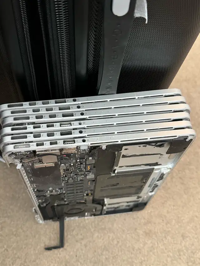 12 top cases with logic boards MacBook Pro models A1502 in Laptops in Edmonton - Image 8