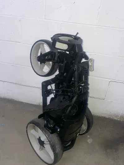 The Easiest Fold on the Course! The CaddyTek V8 golf push cart folds compactly in just 2 steps. Weig...
