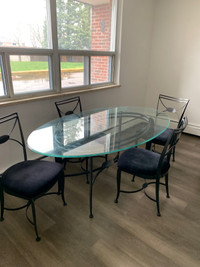 Thick glass top table with 4 matching chairs