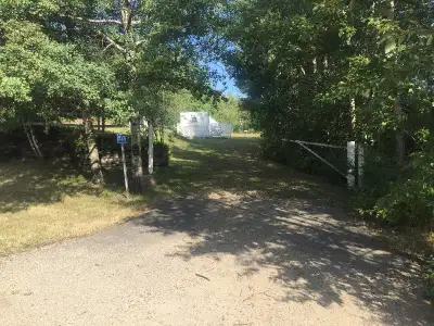 Rosewood Country Estates, Pine Lake, Alberta, Red Deer County This 1.16-acre lot includes a trailer...